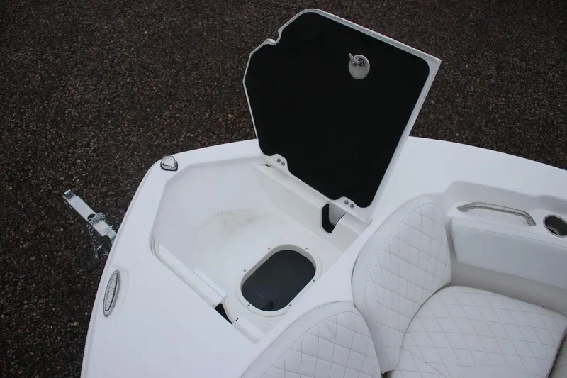 Slide: The Image of Open storage compartment on 2026 Sea Fox 228 Commander boat with quilted seating. - 11