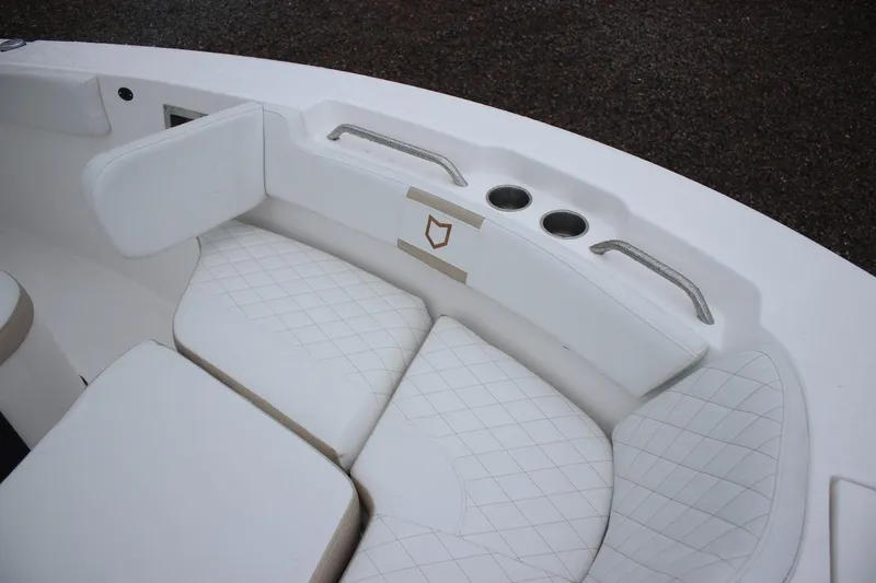 Slide: The Image of Interior seating of 2026 Sea Fox 228 Commander boat with white quilted cushions. - 13