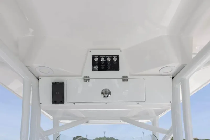 Slide: The Image of Manufacturer Provided Image: 2025 Sea Fox 228 Commander boat console with storage and control panel. - 27