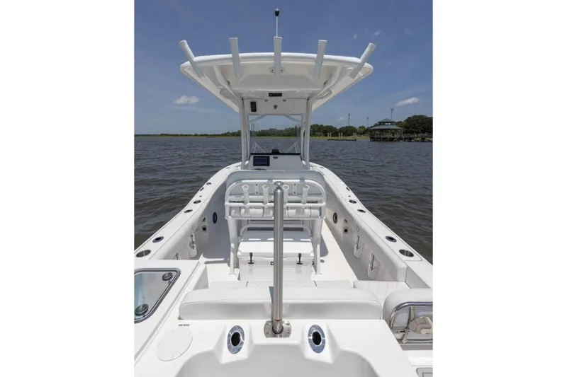 Slide: The Image of Manufacturer Provided Image: 2025 Sea Fox 228 Commander boat interior with T-top on calm water. - 28