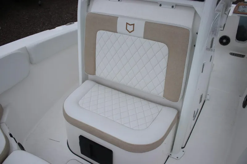Slide: The Image of 2026 Sea Fox 228 Commander boat seat with beige and white diamond-patterned upholstery. - 35