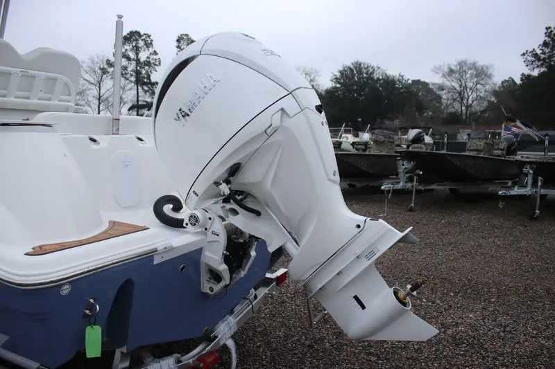 Slide: The Image of 2026 Sea Fox 228 Commander boat with Yamaha outboard motor on gravel lot. - 36