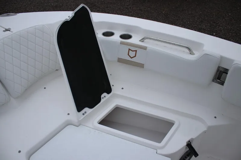 Slide: The Image of Interior view of 2026 Sea Fox 228 Commander boat, featuring storage compartment and seating. - 4