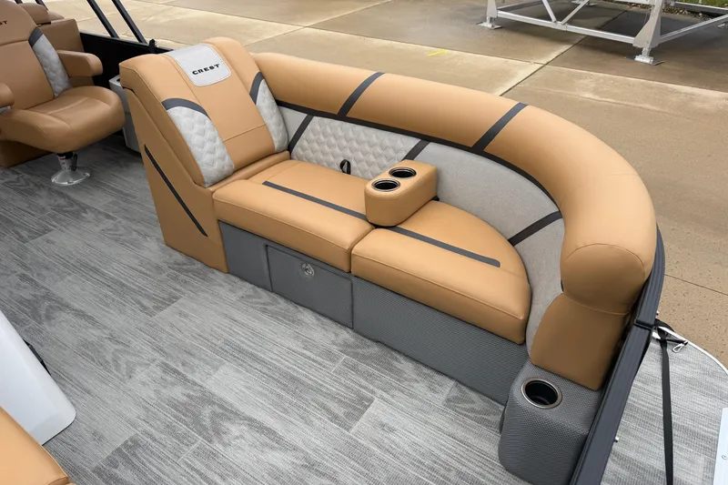 Slide: The Image of Luxurious seating on 2025 Crest Classic 220 pontoon boat with cup holders and stylish design. - 3