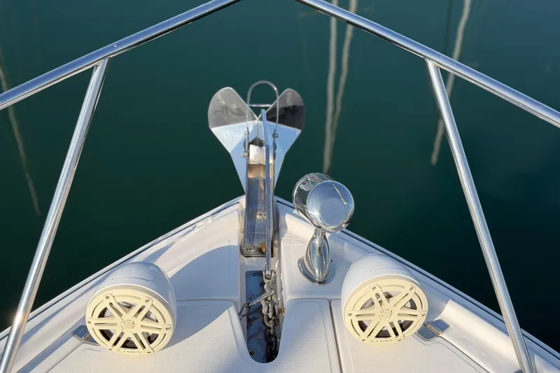 Slide: The Image of Bow view of 2017 Regal 35 Sport Coupe with anchor and speakers. - 39