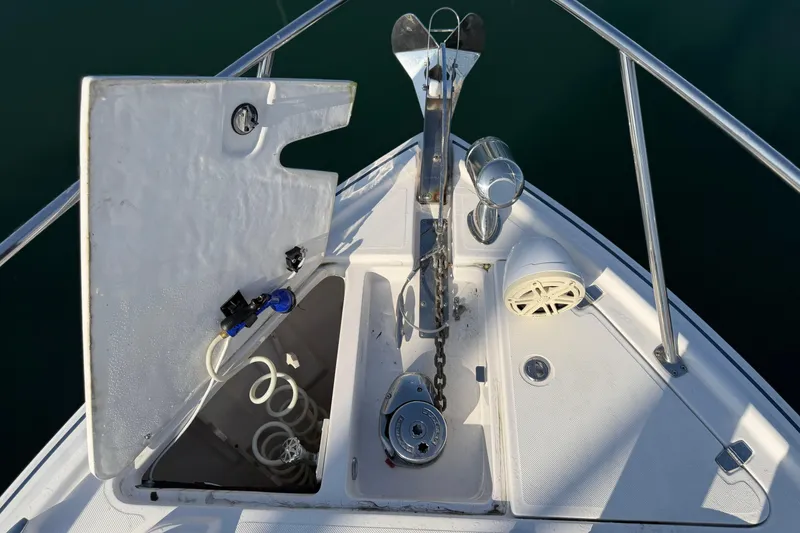 Slide: The Image of Bow of 2017 Regal 35 Sport Coupe with anchor and storage compartments. - 44