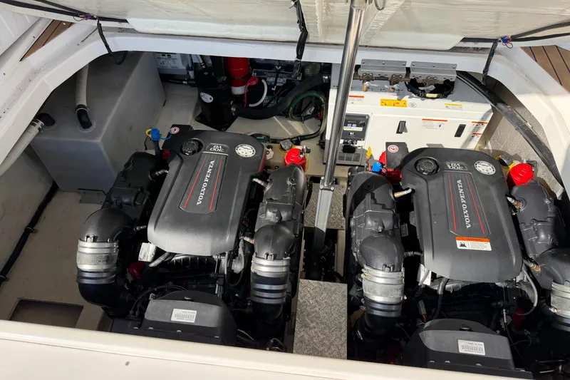 Slide: The Image of Engine compartment of a 2017 Regal 35 Sport Coupe with dual Volvo Penta engines. - 49