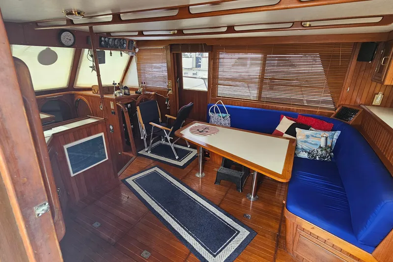 Slide: The Image of Interior of a 1988 Overseas Monk 42 yacht with wooden cabinetry. - 30