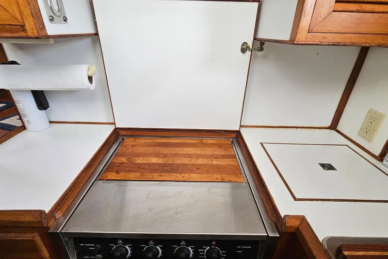 Slide: The Image of 1988 Overseas Monk 42 kitchen with wooden countertops and stove. - 39