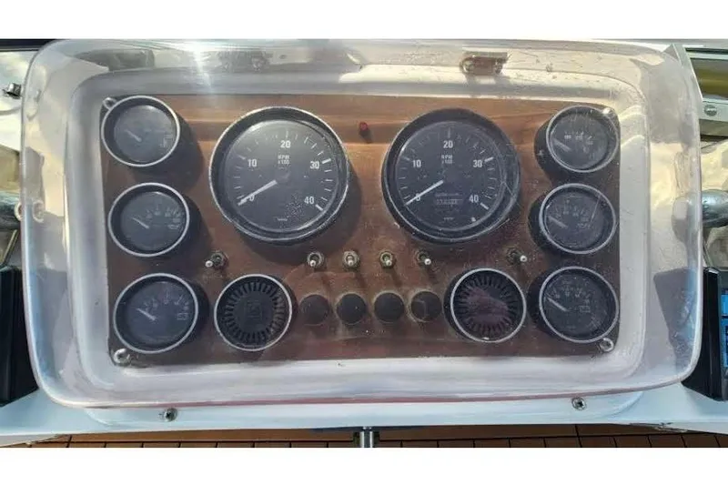 Slide: The Image of Dashboard of a 1988 Overseas Monk 42 boat with gauges. - 17