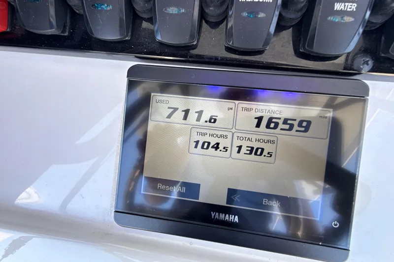 Slide: The Image of Yamaha display on 2021 Sea Hunt Ultra 239 SE showing fuel usage and trip data. - 20