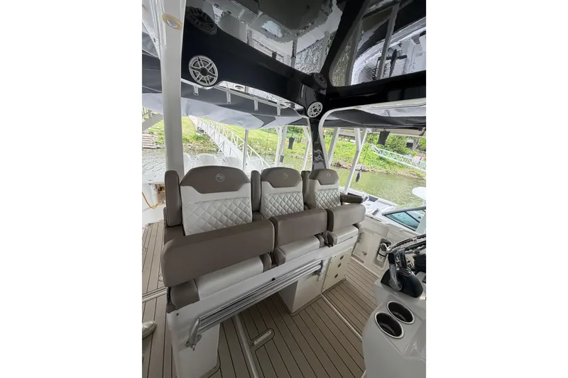 Slide: The Image of Interior of a 2017 Edgewater 368CC boat with luxurious seating and modern design. - 6