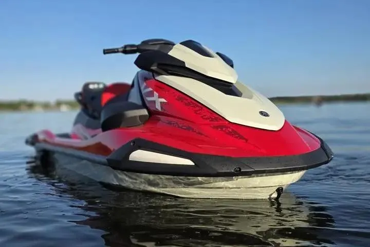 Slide: The Image of 2026 Yamaha WaveRunner VX Cruiser on calm water, showcasing sleek red and white design. - 18