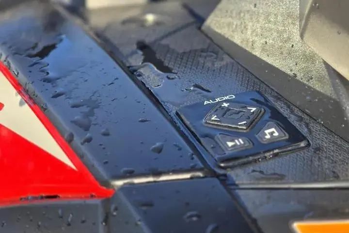 Slide: The Image of 2026 Yamaha WaveRunner VX Cruiser audio controls with water droplets. - 20