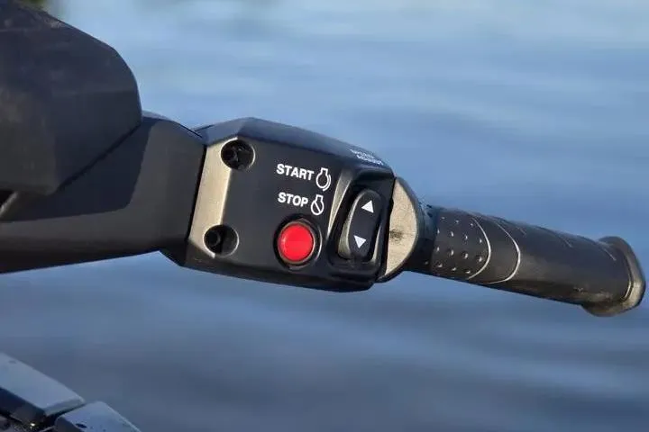 Slide: The Image of Handlebar controls of 2026 Yamaha WaveRunner VX Cruiser on water. - 23