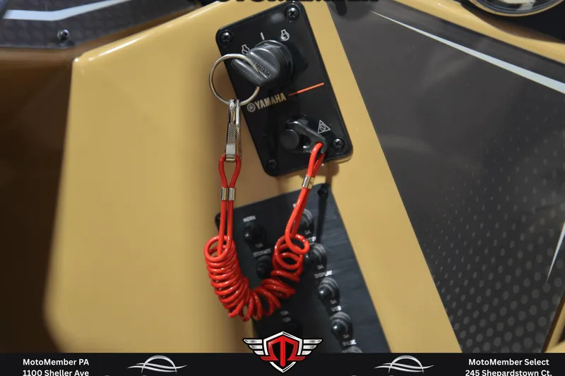 Slide: The Image of Control panel of 2025 SunCatcher Fusion 324SS with Yamaha ignition and red safety cord. - 23