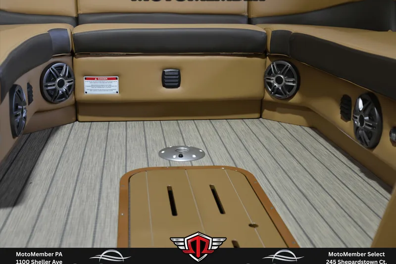 Slide: The Image of Interior of 2025 SunCatcher Fusion 324SS boat with speakers and wood flooring. - 11