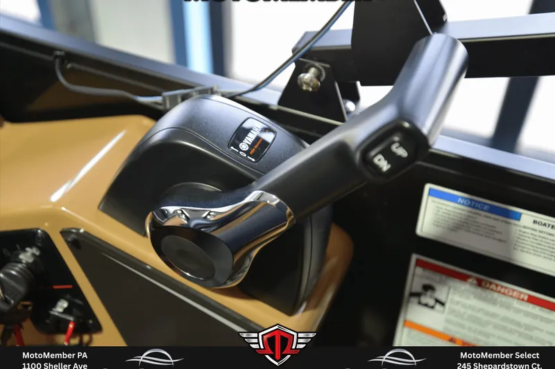 Slide: The Image of 2025 SunCatcher Fusion 324SS boat throttle control with Yamaha branding. - 17