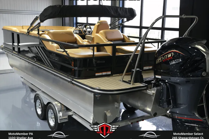 Slide: The Image of 2025 SunCatcher Fusion 324SS pontoon boat with Yamaha SHO VMAX engine in showroom. - 3