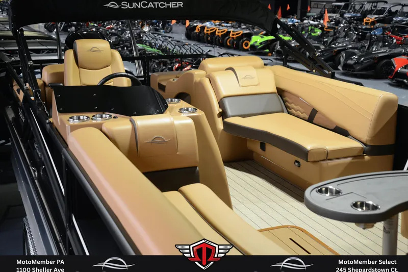 Slide: The Image of Luxurious interior of 2025 SunCatcher Fusion 324SS pontoon boat with tan seating. - 8