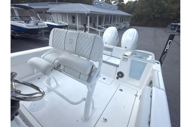Slide: The Image of 2026 Sea Fox 268 Commander boat interior with dual engines and seating. - 11