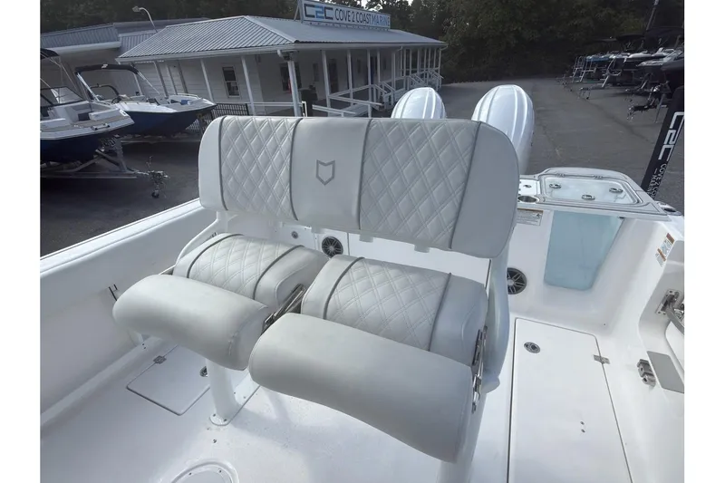 Slide: The Image of 2026 Sea Fox 268 Commander boat interior with cushioned seating and modern design. - 12