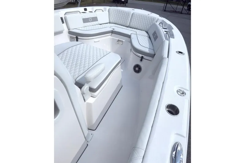 Slide: The Image of Interior view of 2026 Sea Fox 268 Commander boat with cushioned seating. - 7