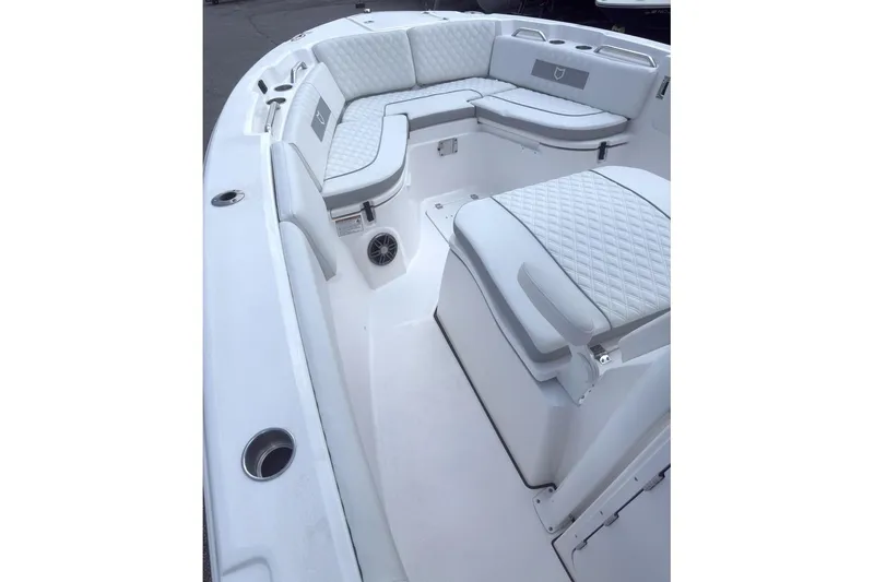 Slide: The Image of 2026 Sea Fox 268 Commander boat interior with white cushioned seating and sleek design. - 8