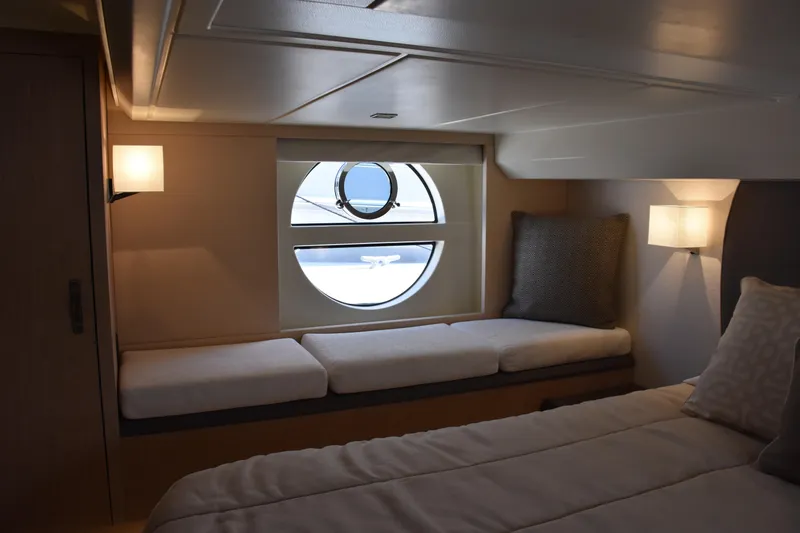 Slide: The Image of Luxurious interior cabin of 2016 Beneteau Monte Carlo 5 yacht with circular window. - 14