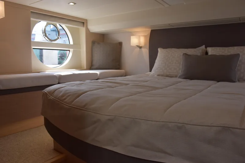 Slide: The Image of Luxurious cabin interior of 2016 Beneteau Monte Carlo 5 yacht with cozy bedding. - 25