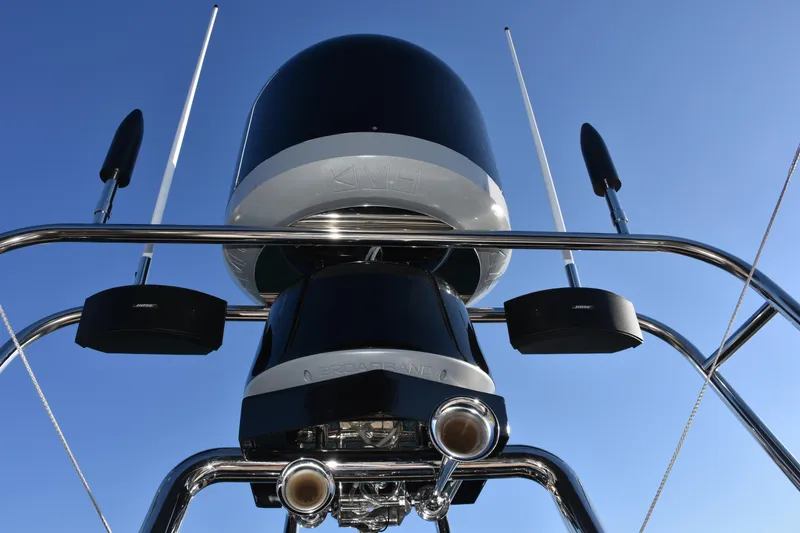Slide: The Image of Radar and speakers on a 2016 Beneteau Monte Carlo 5 yacht against a clear blue sky. - 27