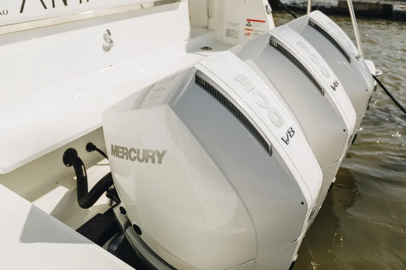 Slide: The Image of Triple Mercury V8 engines on a 2026 Beneteau Antares 12 Fly boat. - 8