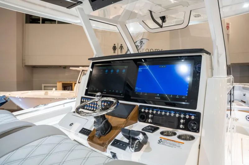 Slide: The Image of Interior view of 2027 Caymas 401 DR with modern helm station. - 10