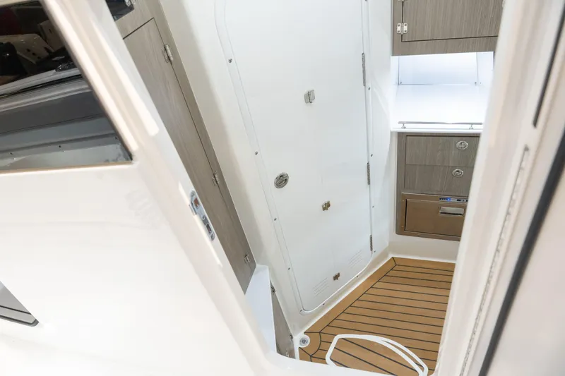 Slide: The Image of Interior of 2027 Caymas 401 DR with wood flooring and cabinets. - 12