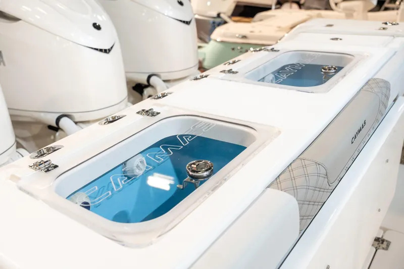 Slide: The Image of Caymas 401 DR 2027 boat with modern engines and storage. - 16