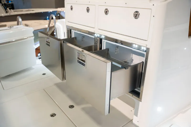 Slide: The Image of Caymas 401 DR 2027 featuring stainless steel drawers in interior. - 9