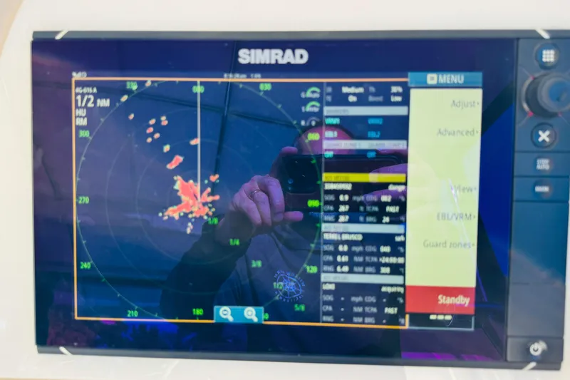 Slide: The Image of Simrad marine radar display on 2000 Cruisers Yachts 3575 Express. - 37