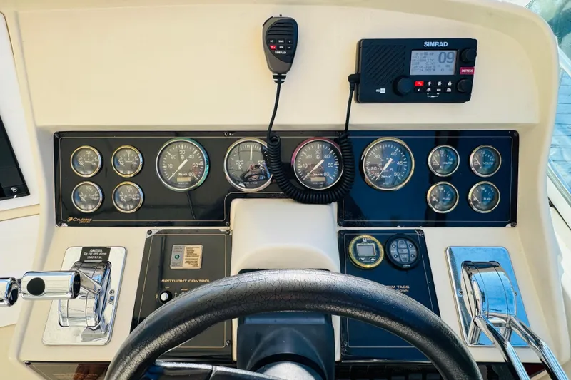 Slide: The Image of Helm of 2000 Cruisers Yachts 3575 Express with gauges and controls. - 40