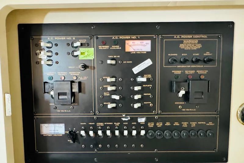 Slide: The Image of Electrical control panel on a 2000 Cruisers Yachts 3575 Express boat. - 59