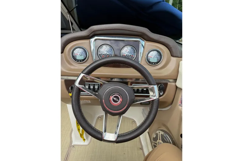 Slide: The Image of Steering wheel and dashboard of 2016 Chaparral 226 SSi Wide Tech boat. - 9