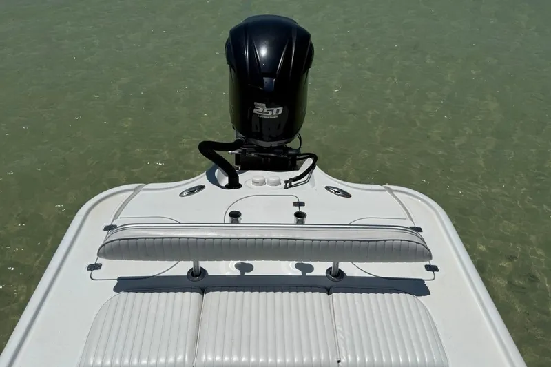 Slide: The Image of 2013 Yellowfin 21 Bay boat with powerful outboard motor on clear water. - 11