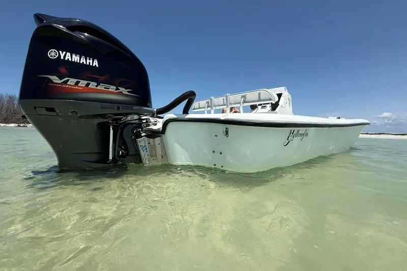 Slide: The Image of 2013 Yellowfin 21 Bay boat with Yamaha VMAX engine in shallow water. - 23