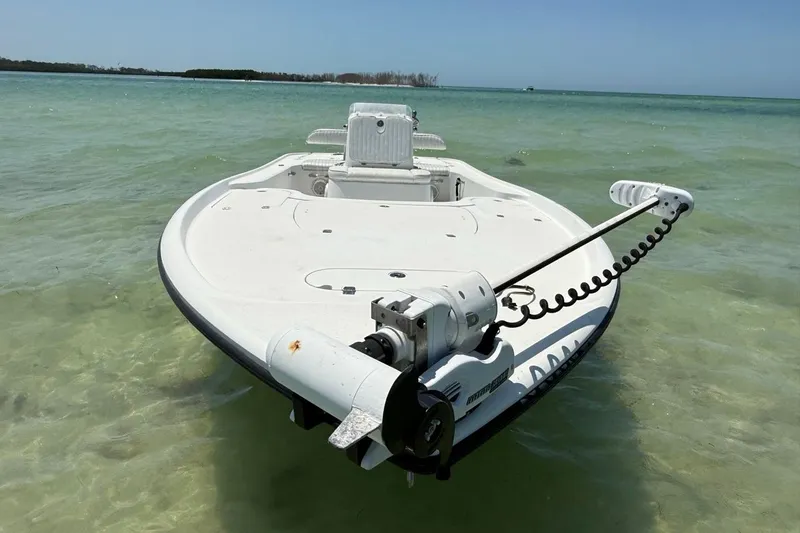 Slide: The Image of 2013 Yellowfin 21 Bay boat in shallow, clear water with trolling motor. - 7