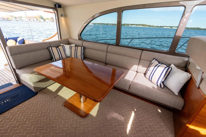 Slide: The Image of Luxurious interior of 2016 Palm Beach Motor Yachts PB50 with elegant seating and scenic water view. - 38