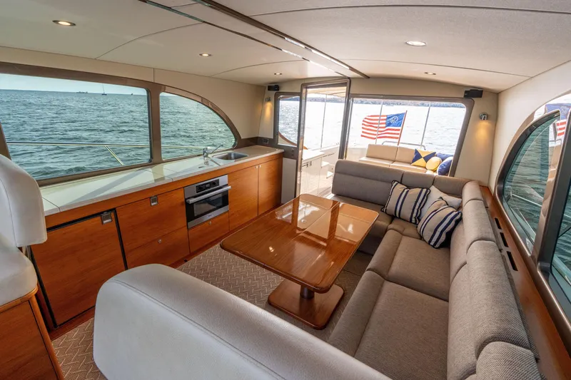 Slide: The Image of Luxurious interior of 2016 Palm Beach Motor Yachts PB50 with ocean view and elegant furnishings. - 45