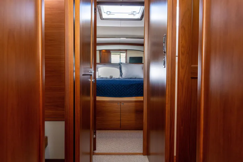 Slide: The Image of Luxurious 2016 Palm Beach Motor Yachts PB50 interior cabin with elegant wood finish. - 50