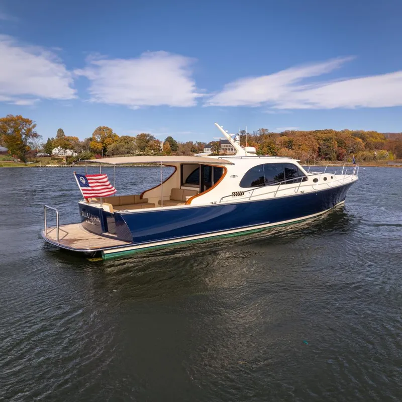 Slide: The Image of 2016 Palm Beach Motor Yachts PB50 on calm water. - 70