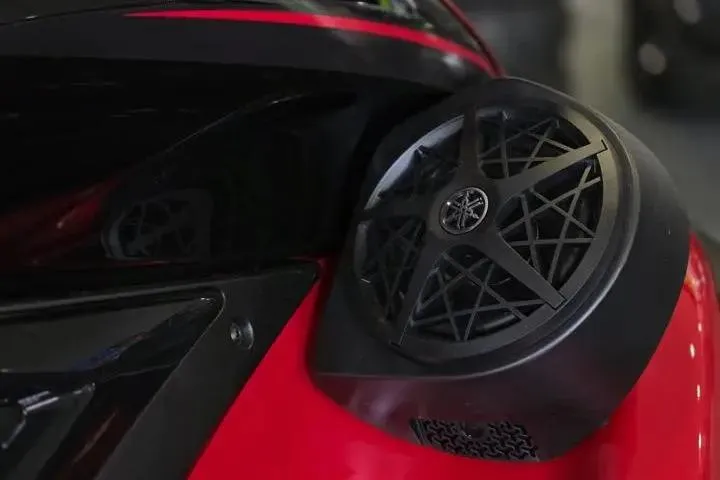 Slide: The Image of 2026 Yamaha WaveRunner FX Cruiser HO speaker detail in sleek black and red design. - 10