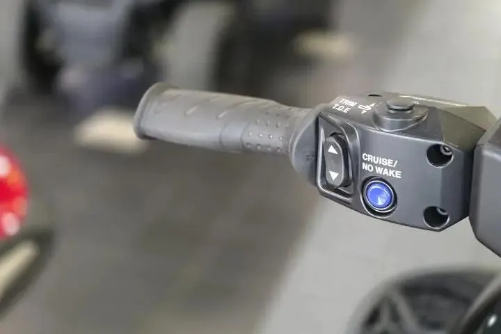 Slide: The Image of Handlebar controls of 2026 Yamaha WaveRunner FX Cruiser HO, featuring cruise and no wake buttons. - 12