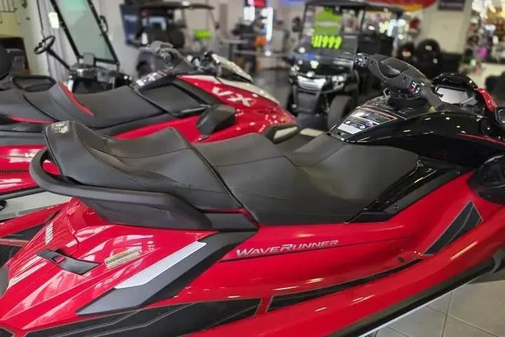 Slide: The Image of 2026 Yamaha WaveRunner FX Cruiser HO in showroom, sleek red design, luxury watercraft. - 6